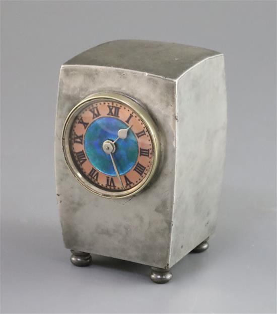 A Liberty & Co. Tudric pewter and enamel timepiece, model no.0756, H. 10.5cm